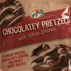 Snack packaging: “Chocolatey Pretzels with White Drizzle. Crunchy pretzel, chocolatey coating, and sweet white drizzle.”