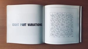 Incomplete Open Cubes book spread with a grid of eight-part cube variations