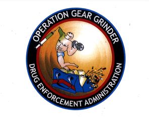 The Operation Gear Grinder patch shows a muscular athlete coming out of a syringe. In front of him is a gym bag filled with pill bottles and syringes.